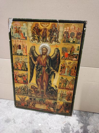 null Important icon on wood painted on a gold background and depicting in its central...