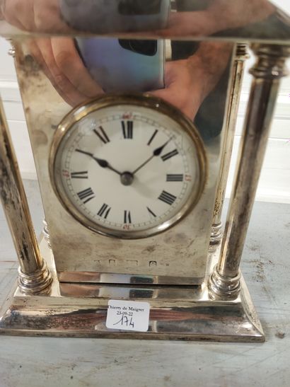 null 
English silver clock in the form of neo-classical architecture with columns,...
