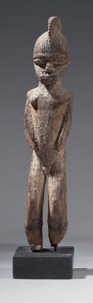 null Lobi statuette (Burkina-Faso)
The character is represented standing, arms along...