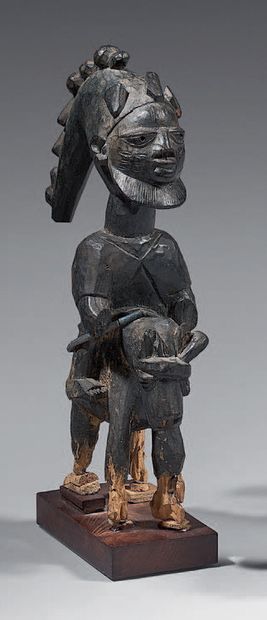  Cavalier Yoruba (Nigeria) Le cavalier barbu porte la coiffe caractéristique du dieu...
