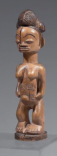 Statuette féminine Punu (Gabon) Elle est...