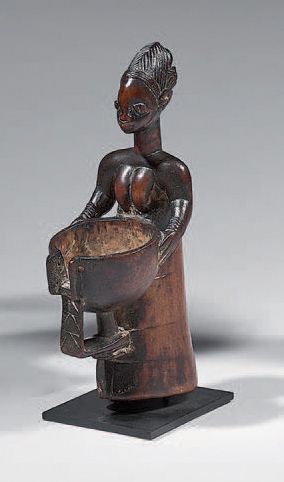 null Yoruba cup carrier (Nigeria)
Superb and ancient cup held by a female figure...
