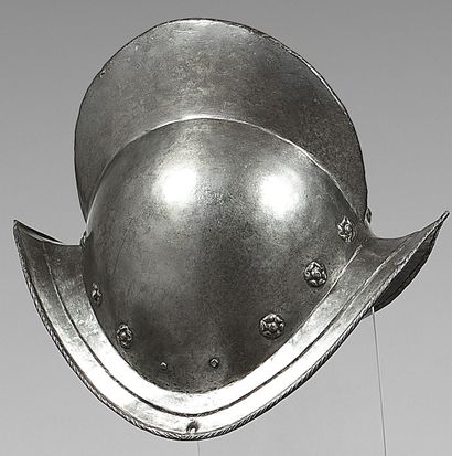 Morion in wrought iron, plain, rivets with...