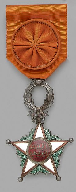 A cross of officer of the order of Ouissam...