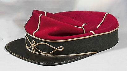 null Cavalry school (?) hussar-type kepi, in madder and blue cloth, white piping...