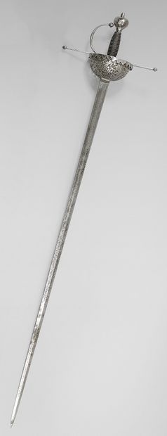 null Sword with taza, cup in iron pierced with decoration of foliage, flowers and...