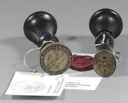 A brass wax seal, oval, with the arms of...