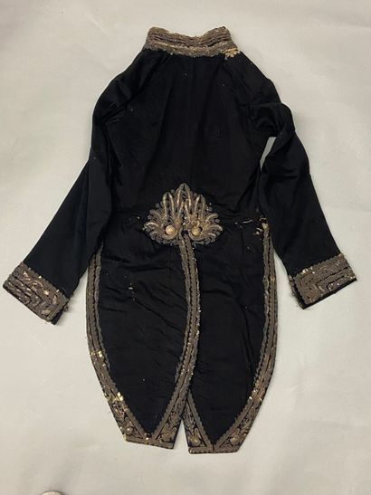 null A general steward's suit in black cloth with silver embroidery, on the right...