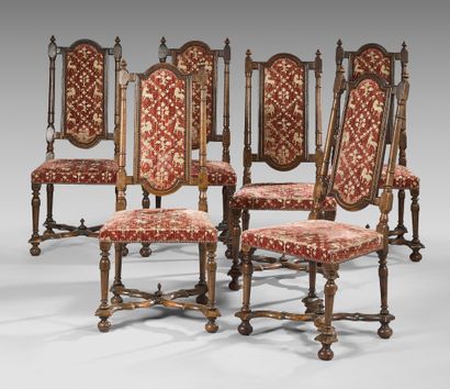 null Suite of six chairs with high flat backs in molded and turned walnut; the backs...