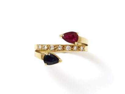 null Ring you and me in gold 750 thousandths, decorated with a ruby and a pear cut...
