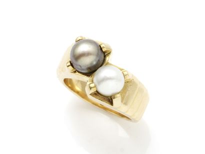 null Ring you and me in gold 750 thousandths, decorated with 2 pearls fine buttons...