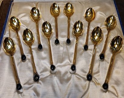 null Twelve oyster forks and twelve tea spoons in silver and gilt metal / France,...