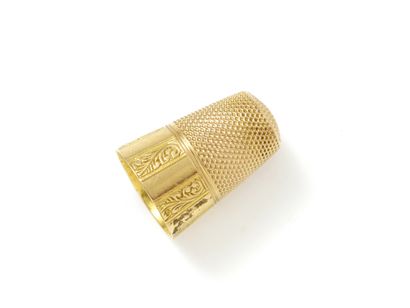 null Thimble in gold 750 thousandths decorated with volutes foliated in alternate...