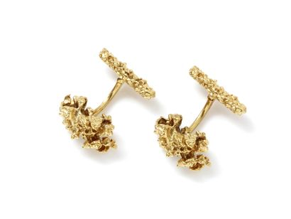 null Pair of articulated cufflinks in gold 750 thousandth, with stylized decoration...