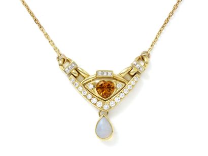 null Necklace in gold 750 thousandth, centered in pendant of an orange sapphire cut...