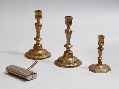 null Lot composed of a pair of Louis XV style copper torches, a 17th century style...