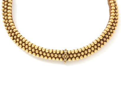 null 
Necklace torque gold 750 thousandths composed of 3 rows of gold pearls, a row...