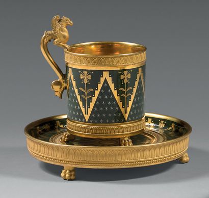 PARIS, Manufacture de NAST Porcelain cup and saucer, both resting on three feet claws,...