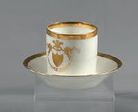 PARIS, Manufacture de NAST Porcelain cup and saucer with white background decorated...