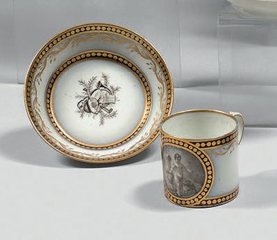 PARIS, Manufacture de NAST Porcelain cup and saucer with friezes of golden dots on...