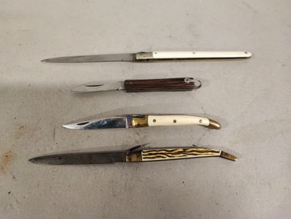null Four fine folding knives, one with deer antler handle, two with bone, one with...