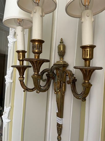 null Pair of three lights sconces 

Louis XVI style 

H : 41 cm

Worn