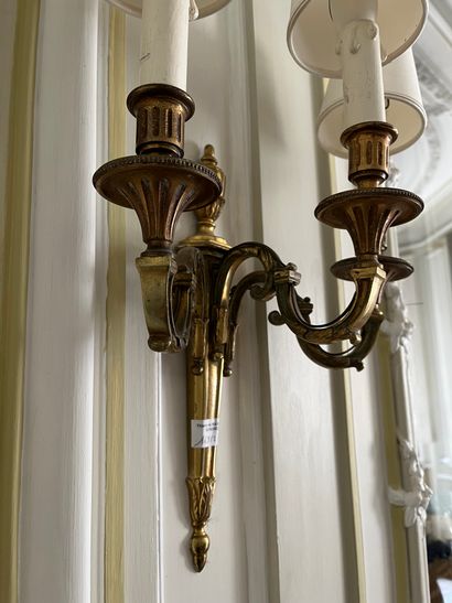 null Pair of three lights sconces 

Louis XVI style 

H : 41 cm

Worn