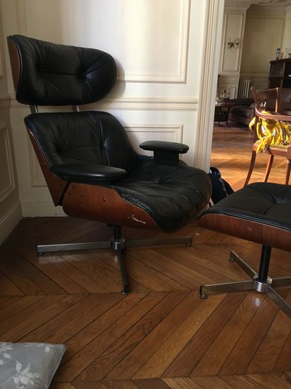 null After Charles Eames, rest chair and footrest in thermoformed wood and black...