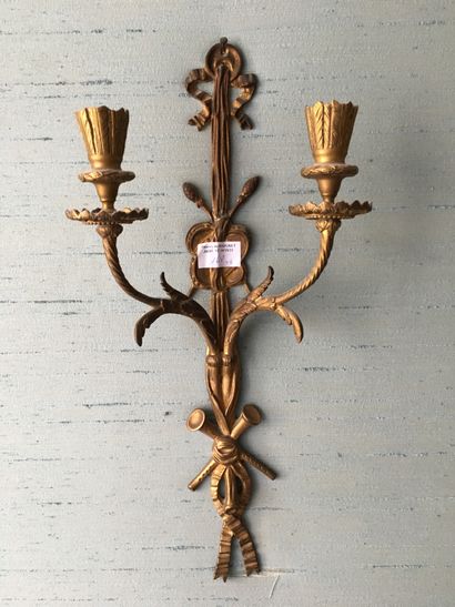 Two pair of sconces, one in gilt bronze decorated...