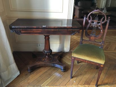null Mahogany and mahogany veneer game table, baluster base. JOINT: chair with lyre...