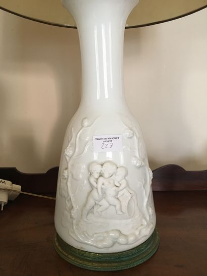 null Porcelain vase with white background, decorated in light relief and in cookie...