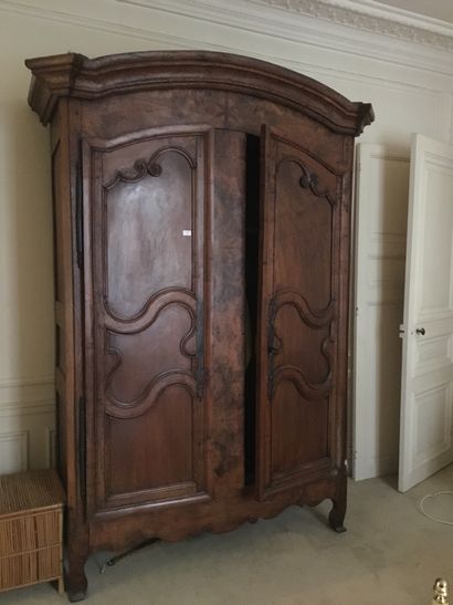 Oak and burrwood cabinet, molded and carved,...