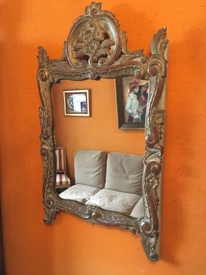 Gilded and lacquered wood mirror, with openwork...