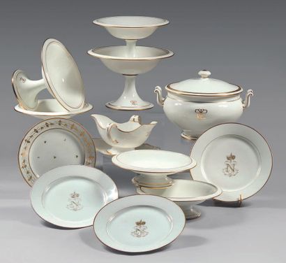 null SEVRESPart of dessert service in white porcelain with golden net, bearing a...