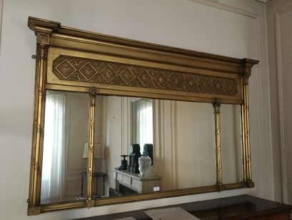 null Trumeau in wood and stucco gilded and carved with fleurons and colonettes, around...