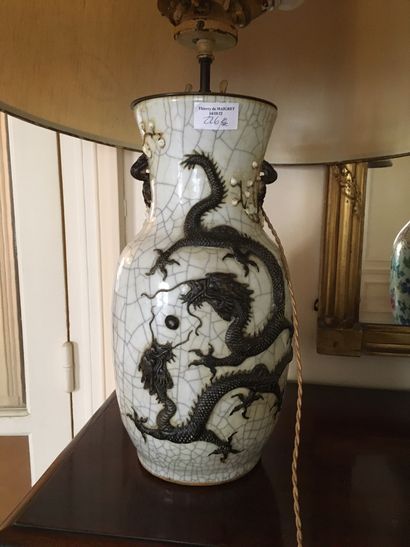 null CHINA. Ceramic vase with cracked beige background, decoration in relief of two...