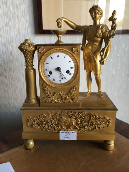 
Gilded bronze clock, decoration of offerers_Restoration...