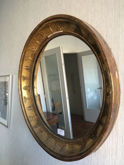 null 
Round mirror in stuccoed wood_XIXth century (ref 7), chips, small missing,...