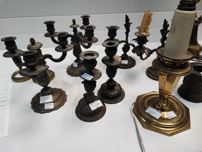 null Strong lot including a set of torches, candelabras, lamp stands and mortars

Ref...