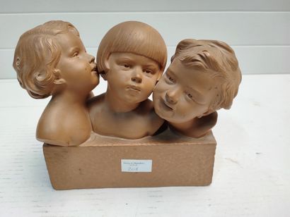 null D. D. Dahiel 

Three heads of a child 

terracotta signed on the side 

21 x...
