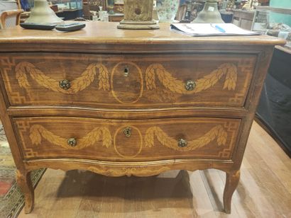 null 
Chest of drawers with curved front opening by two drawers, engraved or xylographed...