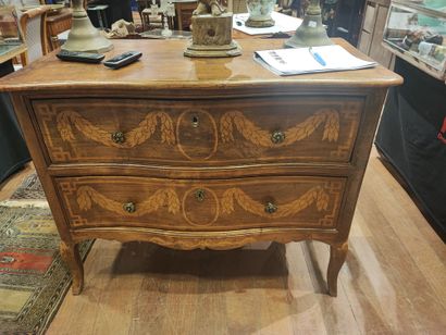 null 
Chest of drawers with curved front opening by two drawers, engraved or xylographed...