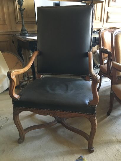 null Armchair with high flat back, in molded wood with shells and palmettes decoration,...