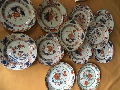 null CHINA. Ten porcelain plates, decorated in the Imari palette with flowers, plants...