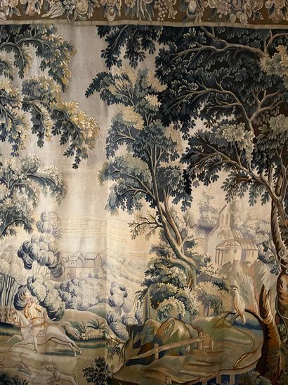 null Tapestry representing an animated landscape of a hunter and his dogs in the...