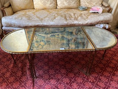 null Oval coffee table in three parts with palm tree decoration

Attributed to the...