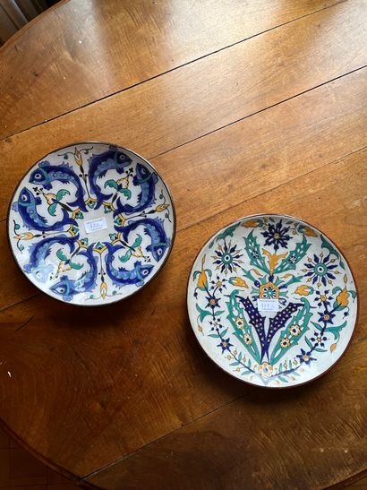 null Two earthenware dishes in the taste of North African productions, one decorated...