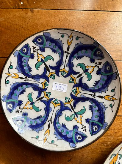 null Two earthenware dishes in the taste of North African productions, one decorated...