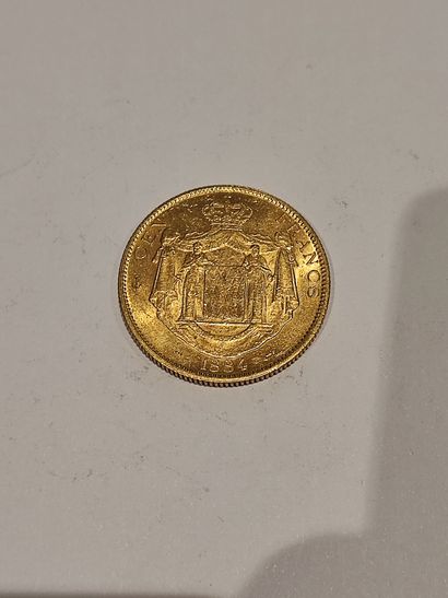null Pièce de 100 Francs or Charles III de Monaco, datée 1884.
32.20 g.

