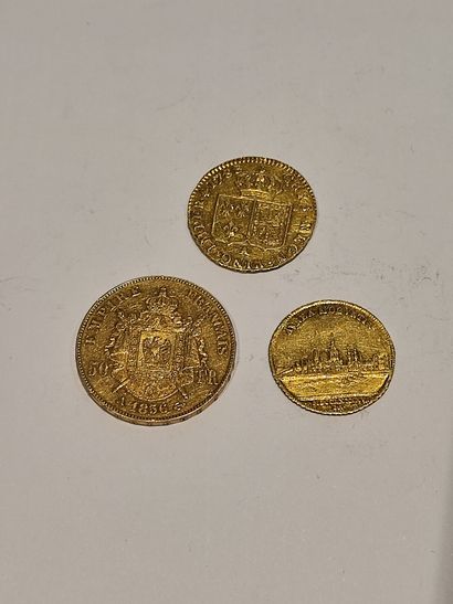null Lot de 3 pièces comprenant :
Pièce de 50 Francs or datée 1856
Pièce de 20 Francs...
